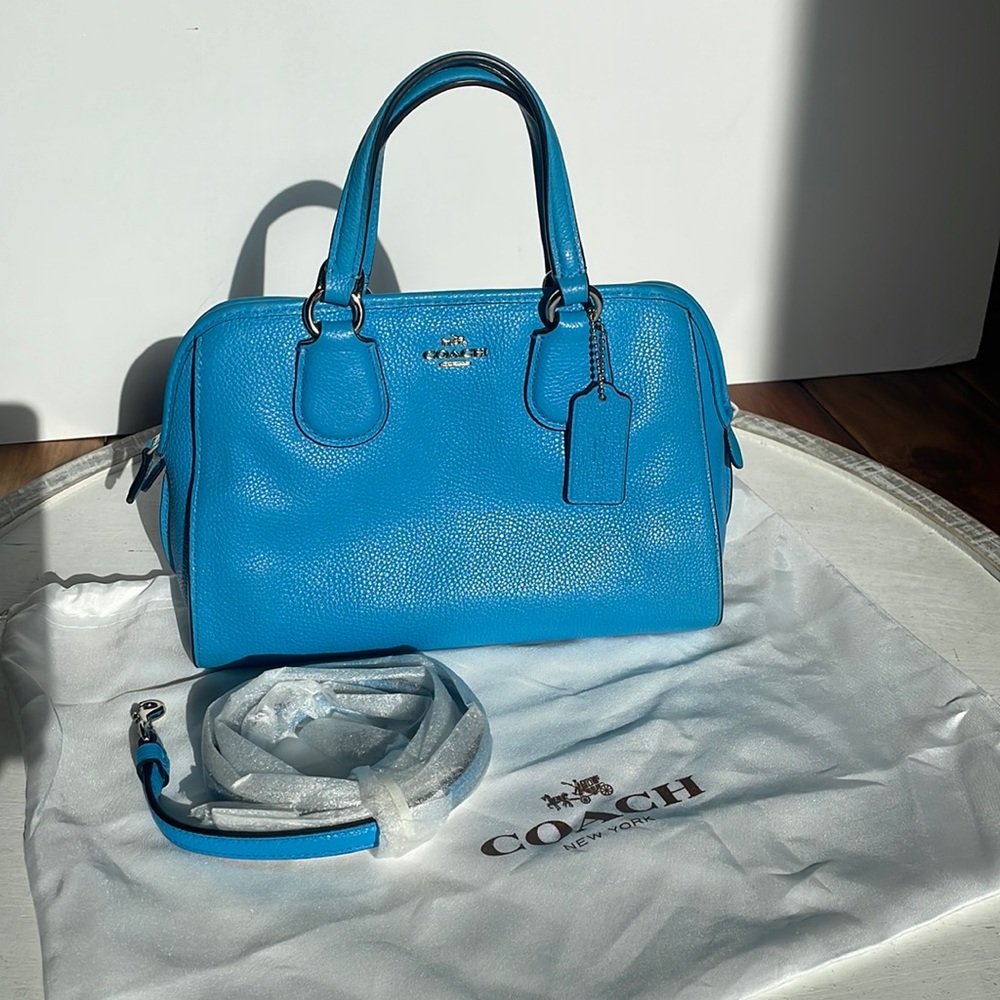 Coach very gently used. Beautiful condition! Silver hardware.